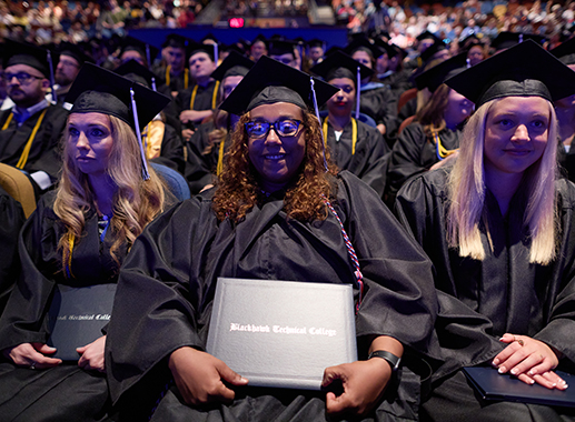 Female graduates at commencement